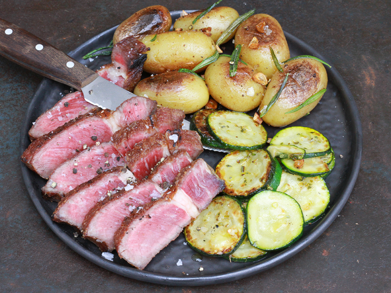 Ribeye steak with grilled potatoes